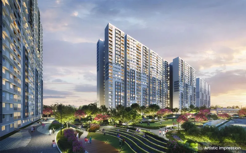 Adarsh Welkin Park towers and landscaped podium at dusk